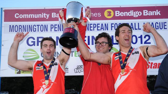 Troy Schwarze (right) with the 2012 premiership cup.