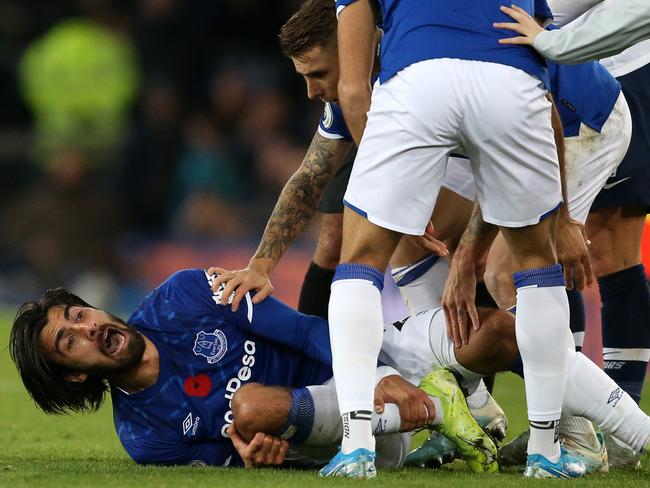 LIVERPOOL, ENGLAND - NOVEMBER 03: Andre Gomes of Everton reacts after being tackled by Son Heung-Min of Tottenham Hotspur during the Premier League match between Everton FC and Tottenham Hotspur at Goodison Park on November 03, 2019 in Liverpool, United Kingdom. (Photo by Jan Kruger/Getty Images)