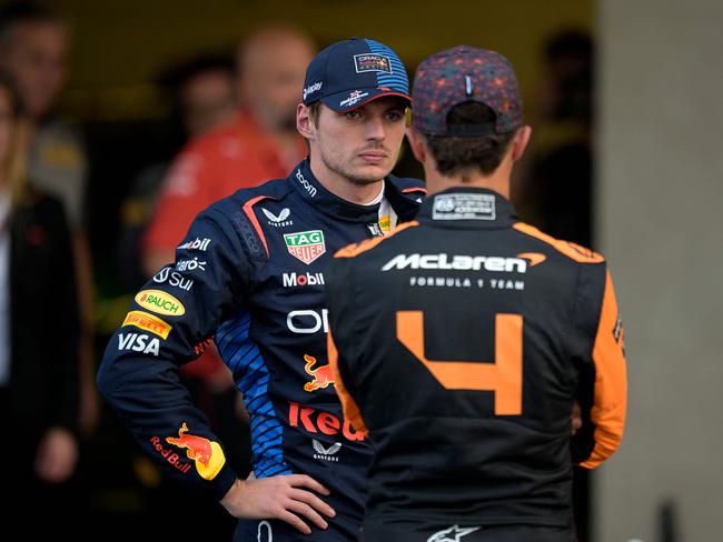 Red Bull Racing's Dutch driver Max Verstappen (L) talks with McLaren's British driver Lando Norris after the qualifying session of the Formula One Mexico City Grand Prix at the Hermanos Rodriguez racetrack, in Mexico City on October 26, 2024. (Photo by Alfredo ESTRELLA / AFP)