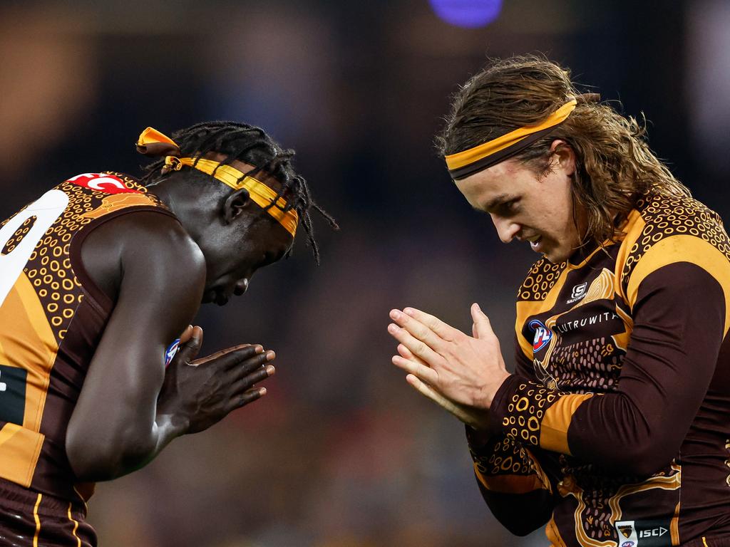 MELBOURNE, AUSTRALIA - MAY 26: Jack Ginnivan of the Hawks celebrates a goal with teammate Changkuoth Jiath during the 2024 AFL Round 11 match between the Hawthorn Hawks and the Brisbane Lions at Marvel Stadium on May 26, 2024 in Melbourne, Australia. (Photo by Dylan Burns/AFL Photos via Getty Images)