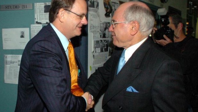 Angry greeting ... Mark Latham’s bizarre aggressive handshake was a signal moment of the 2004 election campaign. Picture: John Feder