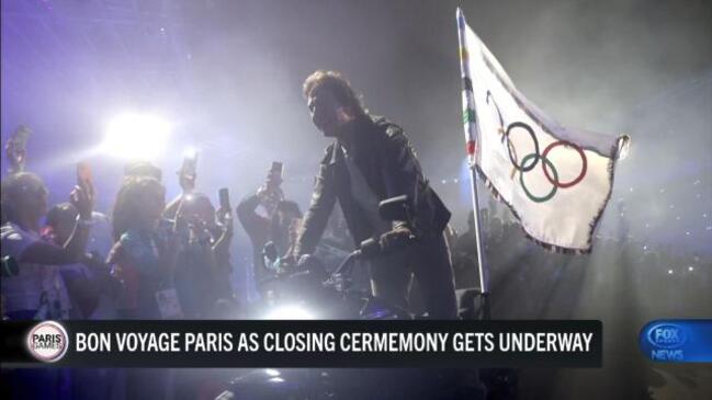 Tom Cruise passes the Olympic baton to LA