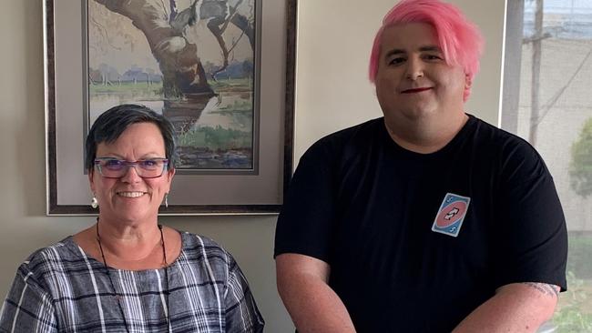 Tosh-Jake Finnigan (right) has been elected to Colac Otway Shire Council, and claims they are the first trans-identifying councillor in the state. He is pictured with the council's chief executive Anne Howard. Picture: Colac Otway Shire Council.