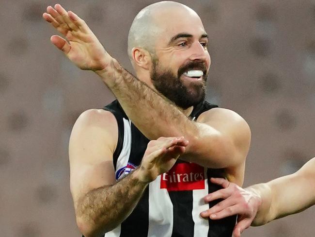 Steele Sidebottom of the Magpies celebrates after kicking a goal during the Round 3 AFL match between the Collingwood Magpies and the St Kilda Saints at the MCG in Melbourne, Saturday, June 20, 2020. (AAP Image/Scott Barbour) NO ARCHIVING, EDITORIAL USE ONLY