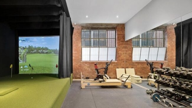 The golf simulator and large gym.