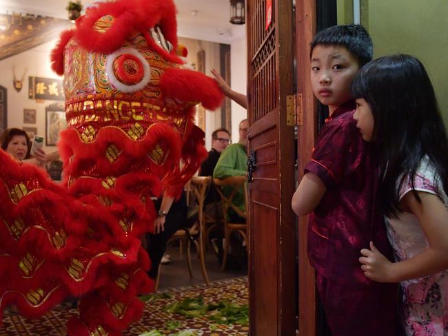 Diners at the Khoo Chean House watch as dancers from the Australian Chinese Buddhist Society perform during Chinese New Year celebrations in Chinatown, Sydney Sunday, 14 February 2021. In 2021 the City of Sydney has organised 80 events to celebrate Lunar New Year, but only three will take place in the cityÃs original Chinatown. Long-term residents, business owners and community members feel left out by the decision, one of several acts they claim the City of Sydney has done in the past four years in a bid to take Chinese New Year away from Chinatown. Picture Sam Mooy/The Australian Newspaper