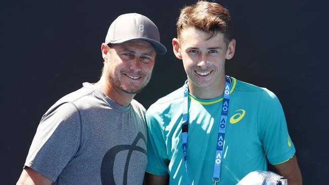 A teenage de Minaur had early experience with Australia’s Davis Cup squad after being called up as an ‘orange boy’ by captain Lleyton Hewitt (left). Picture: Michael Klein