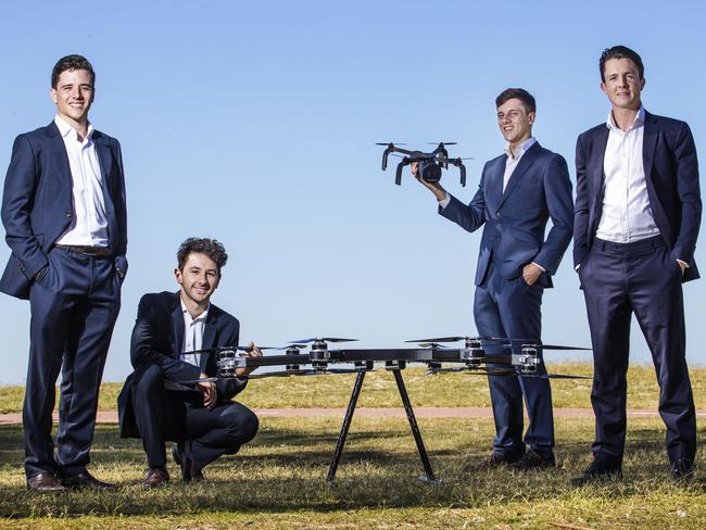 12/04/2018: (L-R) Jack Cullen, 22, Daniel Moscaritolo, 22, Samuel (Sam) Lewinson 21, and Lachlan (Lochie) Burke, 22, are the founders of JAR Aerospace, a startup developing advanced autonomous flight platforms. Photographed with two of their prototype drones at Brighton-Le-Sands on Thursday. Hollie Adams/The Australian