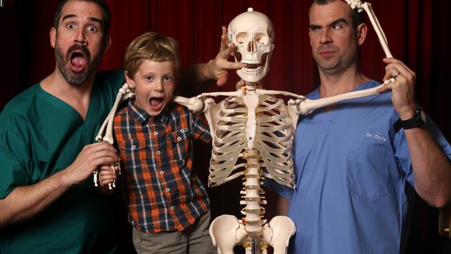 Xand and Chris van Tulleken with Charlie Morrison, 5, in Adelaide in 2017, with their kids program to explain bodily functions Picture: Kelly Barnes/The Australian