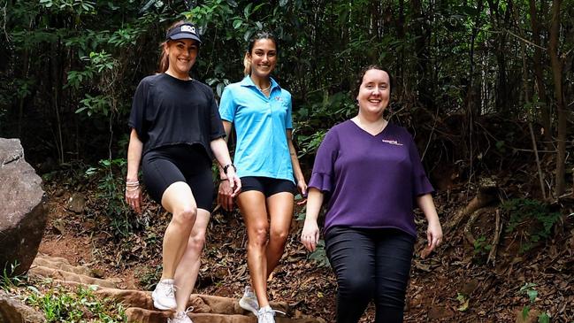 The Far North Queensland Hospital Foundation will host the Arrow Experience charity walk this Sunday, with participants hiking the Green, Blue, Red and Yellow Arrow trails consecutively in Mt Whitfield Conservation Park. Stacey Young, Tilly Wickramasekera and the Hospital Foundation's Sharni Whitaker will all participate in the walk, which will raise money for a $4 million da Vinci surgical robot for the Cairns Hospital. Picture: Brendan Radke