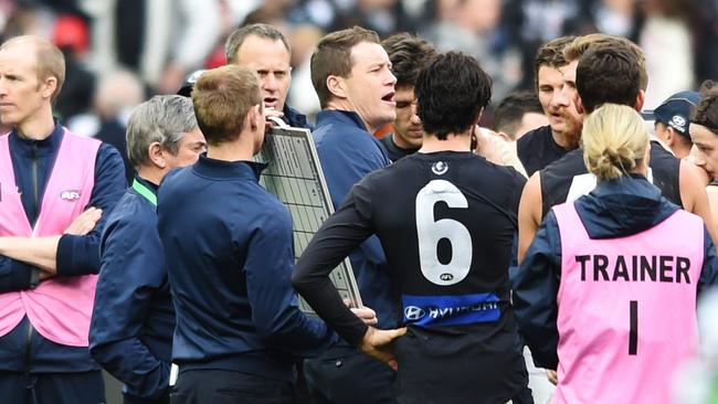 Barker acting as caretaker coach in 2015 after the sacking of Mick Malthouse. Picture: AAP Image/Tracey Nearmy