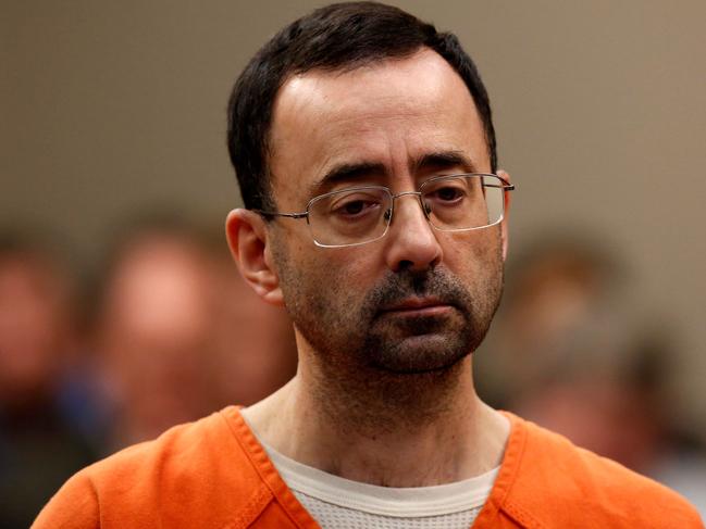 (FILES) Former Michigan State University and USA Gymnastics doctor Larry Nassar appears at Ingham County Circuit Court in Lansing, Michigan, on November 22, 2017. Larry Nassar, the former USA Gymnastics team doctor convicted of sexually assaulting hundreds of athletes, was in stable condition on July 10, 2023, after being stabbed multiple times by another inmate, a prison union official said. Nassar, 59, was attacked on the afternoon of July 9, 2023, at the federal USP Coleman II prison in Sumterville, Florida, where he is serving his sentence, Joe Rojas, the president of the local correctional officers union, told AFP. (Photo by JEFF KOWALSKY / AFP)