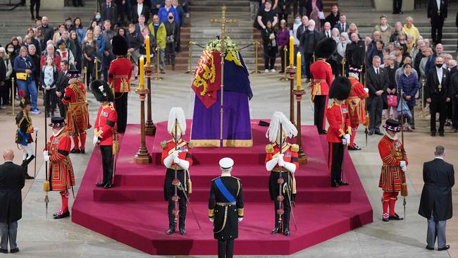 King Charles III, Princess Anne, Princess Royal, Prince Andrew, Duke of York, and s Prince Edward, Earl of Wessex arrive to mount a vigil around the coffin of Queen Elizabeth II lying in state on the catafalque in Westminster Hall, at the Palace of Westminster in London. (Photo by Yui Mok / POOL / AFP)