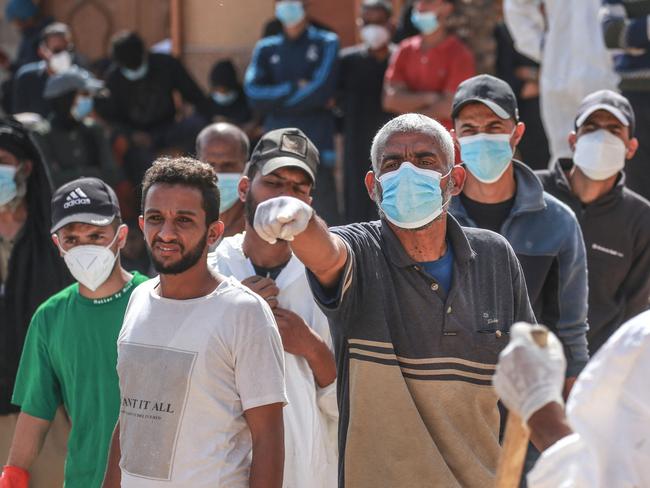 Palestinian health workers dig for bodies buried in Nasser hospital compound in Khan Yunis in the southern Gaza Strip on April 21, 2024, as battles continue. Picture: AFP