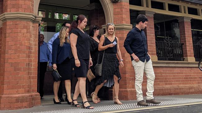 The family of Craig Smith walking out of court after the hearing. Picture: Toby Vue