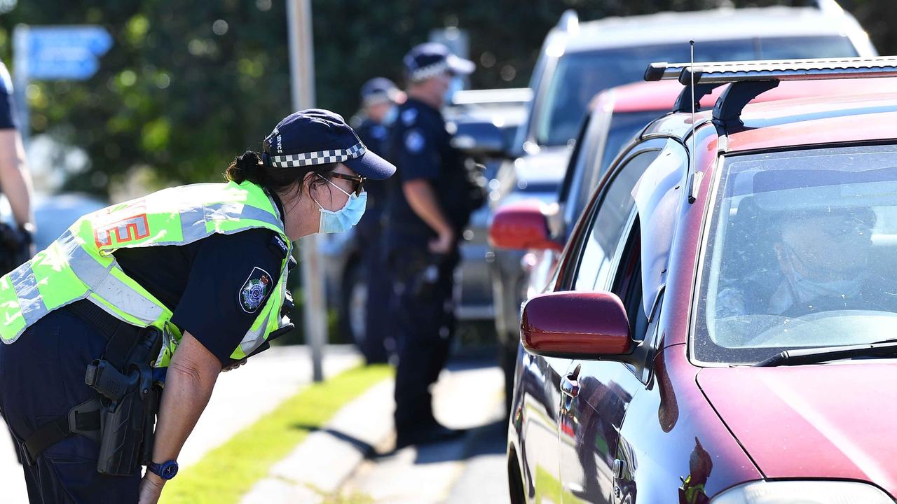 Police conduct travel checks during lockdown at Alexandra Headland on Wednesday. Picture: Patrick Woods.