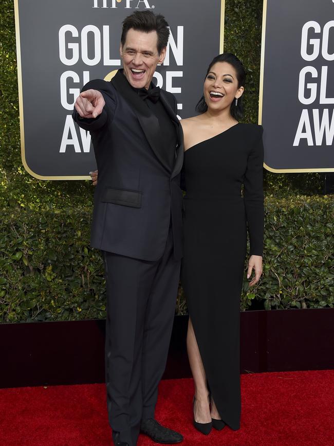 Jim Carrey and Ginger Gonzaga. Picture: AP