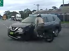 Insane moment motorcyclist crunched by car