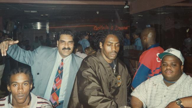 Surfers Paradise Glitter Strip nightclub VIP host Jimmy Ozturk (second left) with Coolio (second from right) at Cocktails and Dreams nightclub, Gold Coast — he worked as a host with the most at venues including Players, Shooters, Rose and Crown, Bourbon Bar and many more. His final post was out the front of Hollywood Showgirls on Orchid Avenue where he worked five nights a week from 8pm to 3am.