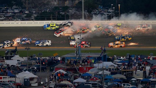 Chain reaction: The 21-car pile-up brings Daytona to a fiery halt. Picture: Brian Lawdermilk/Getty Images/AFP