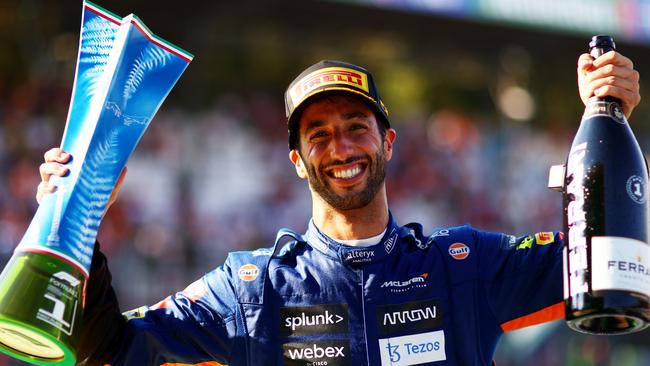 Daniel Ricciardo celebrates on the podium after winning the F1 Grand Prix of Italy at Autodromo di Monza on September 12, 2021. Picture: Getty Images