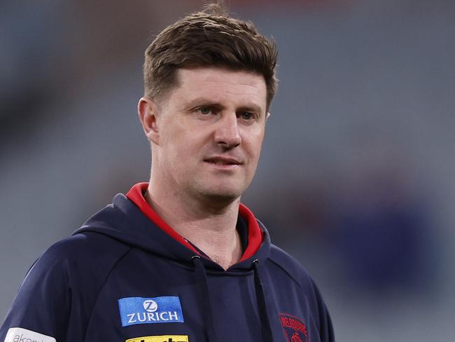 MELBOURNE, AUSTRALIA - AUGUST 23: Melbourne assistant coach Andrew McQualter looks on before during the round 24 AFL match between Melbourne Demons and Collingwood Magpies at Melbourne Cricket Ground, on August 23, 2024, in Melbourne, Australia. (Photo by Darrian Traynor/Getty Images)