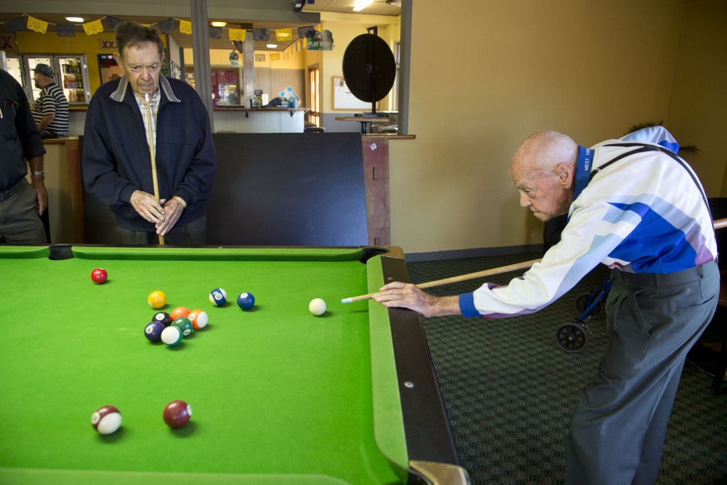 POOL PALS: Milne Bay veterans Bert Miles ( on right ) and Kev Olsen meet regularly at The Newyown Hotel for a meal and game of pool . Thursday, Apr 16 , 2015 . Photo Nev Madsen / The Chronicle. Picture: Nev Madsen