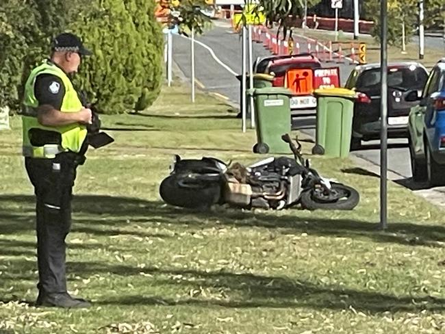 A man is fighting for his life after his motorcycle crashed into a tree in Southport. Picture: Charlton Hart