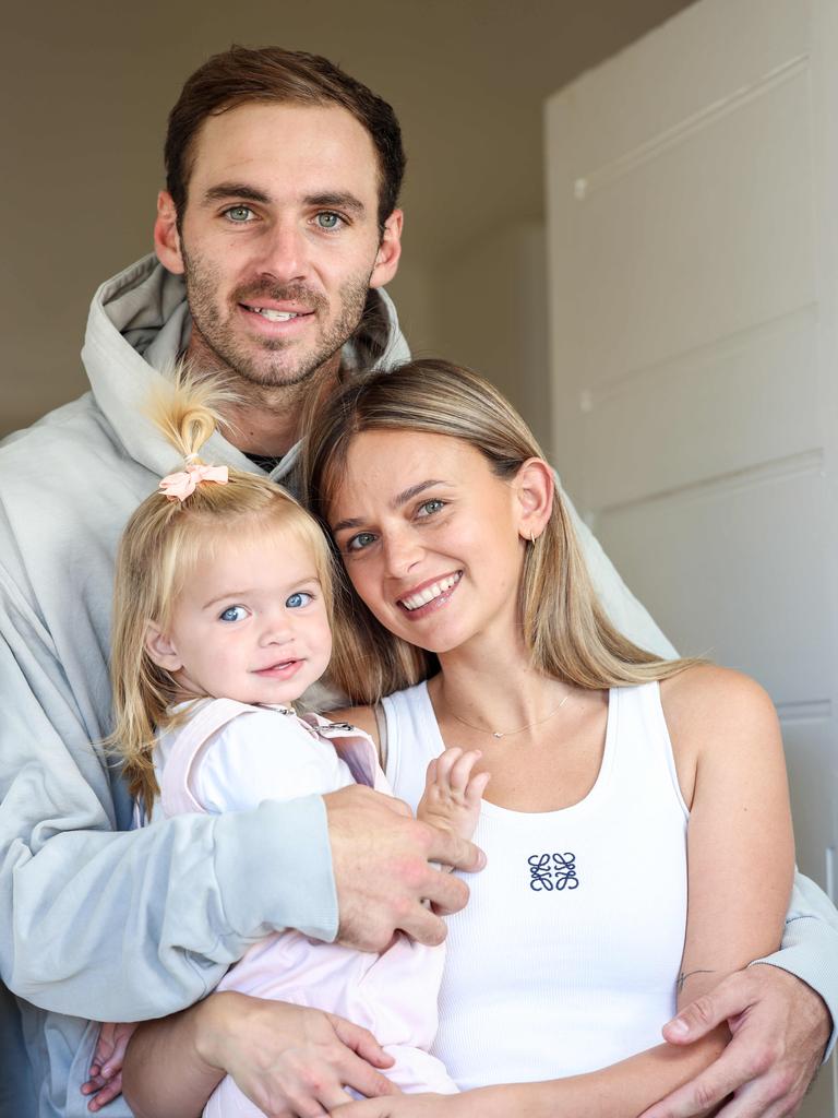 Kellie Finlayson with her husband Jeremy and daughter Sophia. Picture: Russell Millard