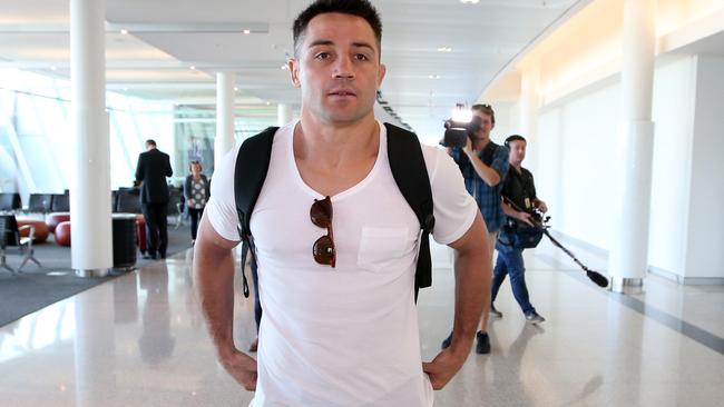 Cooper Cronk arrives at Canberra Airport.