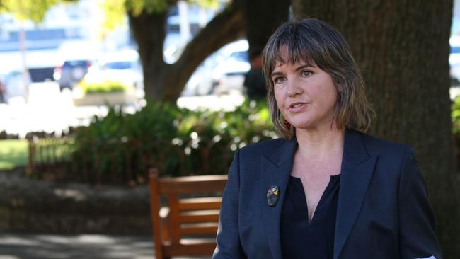 Australia Institute Tasmania director Eloise Carr speaks to the media on Parliament Lawns in Hobart on Tuesday, April 27, 2021.