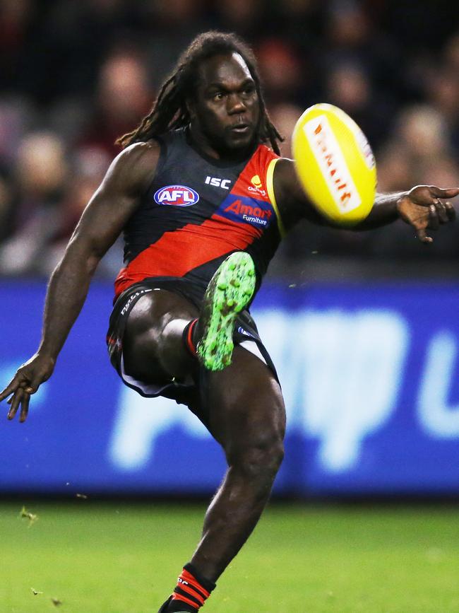 Anthony McDonald-Tipungwuti of the Bombers kicks a goal during the round 17 match against North Melbourne. Picture: Getty Images