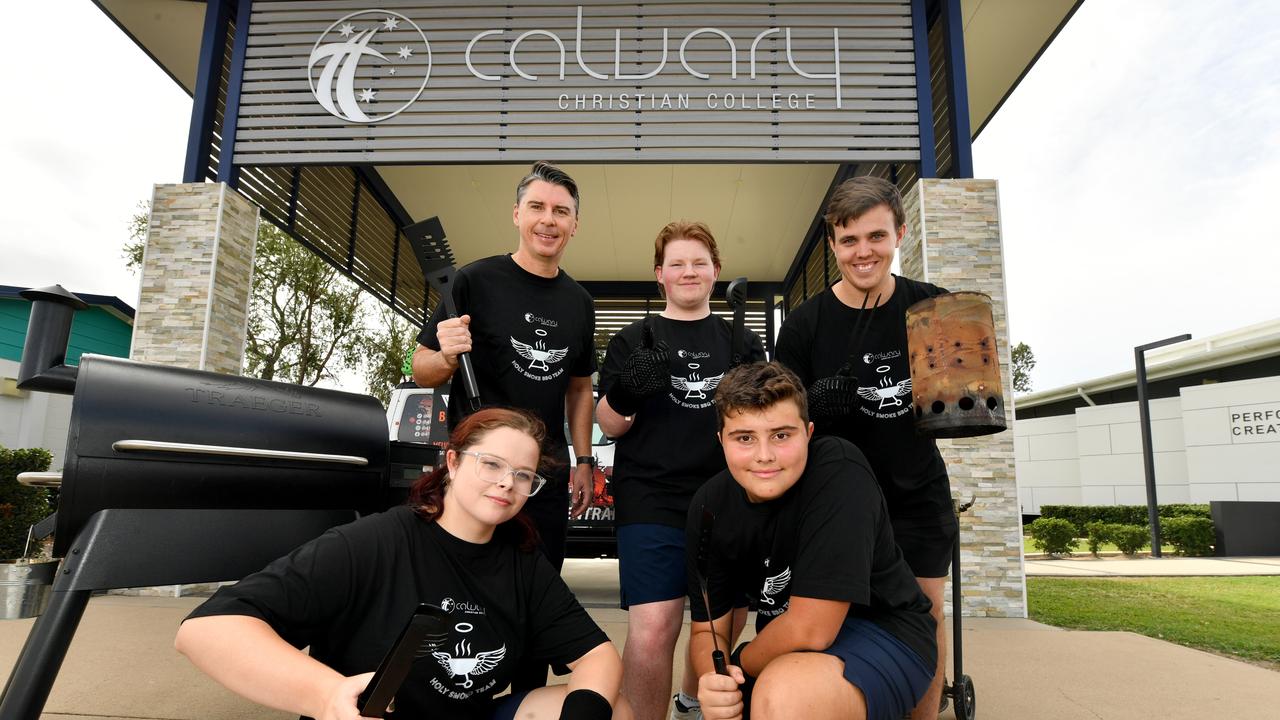 Calvary Christian College director of secondary college Martin Vucetic and teacher Josh Nerboni with students Isabella Hay, 17, Jeremy March, 17, and Jameson Sturzaker, 14, are part of the Holy Smokes. Picture: Evan Morgan