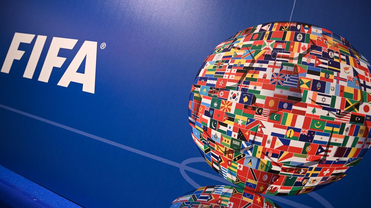 FIFA bans Russian national anthem and flag from international games. Photo by OZAN KOSE / AFP