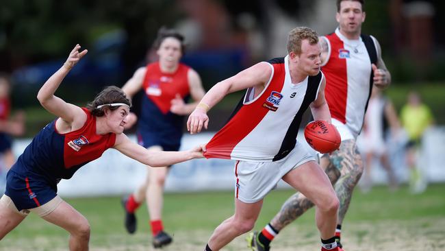 SFNL Football: Bentleigh v St Kilda City at Bentleigh Reserve. Malcolm Neiwand has a passenger. Picture: Steve Tanner