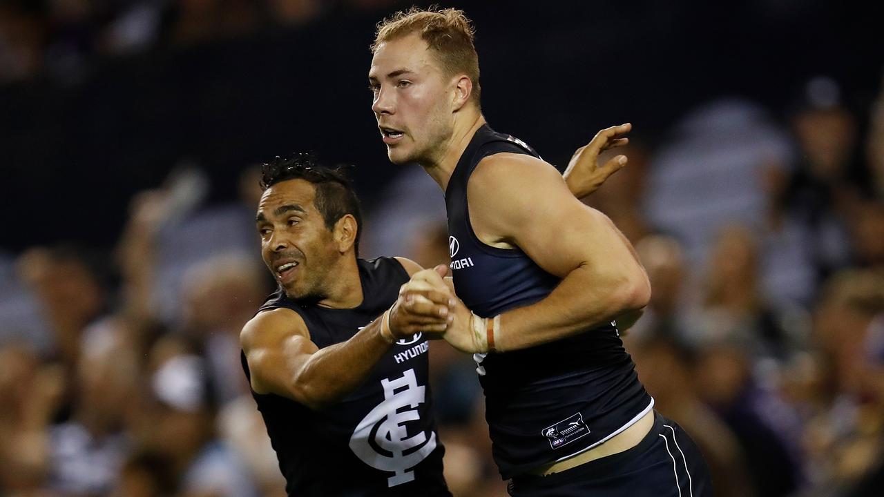 MELBOURNE, AUSTRALIA - APRIL 04: Eddie Betts (L) and Harry McKay of the Blues celebrate during the 2021 AFL Round 03 match between the Carlton Blues and the Fremantle Dockers at Marvel Stadium on April 04, 2021 in Melbourne, Australia. (Photo by Michael Willson/AFL Photos via Getty Images)