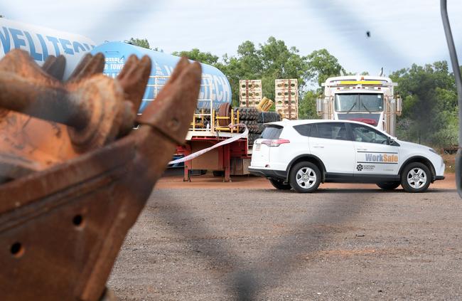 NT WorkSafe investigators’ car at the Tivendale site. Picture: Keri Megelus