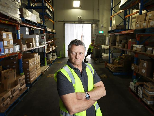 31/1/25: Godden Food Group owner Jeff Godden inside his cold storage(this uses the most power)at one of his warehouses in Sydney. His power bill has increased in NSW by 230 per cent. John Feder/The Australian.