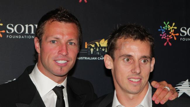 Luke Wilkshere (right) alongside another former Sydney-born Socceroo in Lucas Neill.