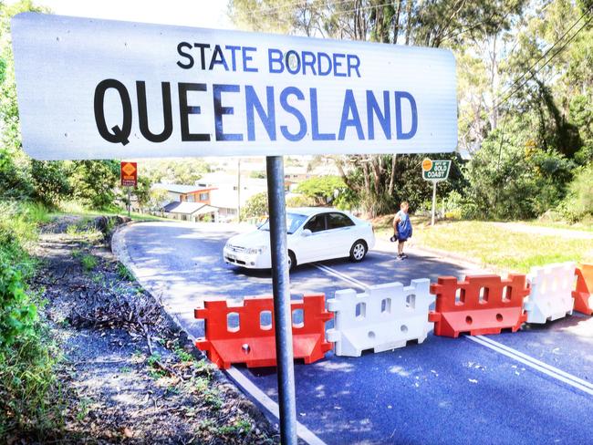 A stranded driver tries to re enter Tweed Heads NSW at the Queensland Border but due to current Queensland Closed Borders he is unable to drive the 75 metres to his home.Photo: Scott Powick Newscorp