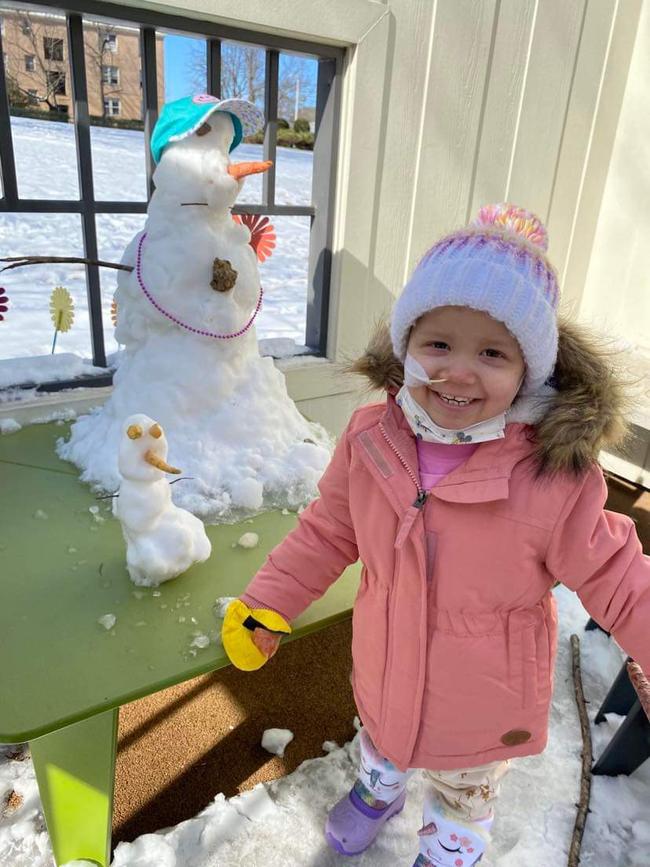 Hailey the first time she saw snow. Picture: Supplied by family