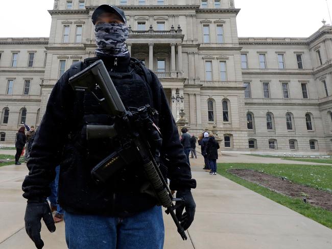 An armed protester outside the Michigan State Capitol in Lansing, Michigan, in April. Picture: AFP