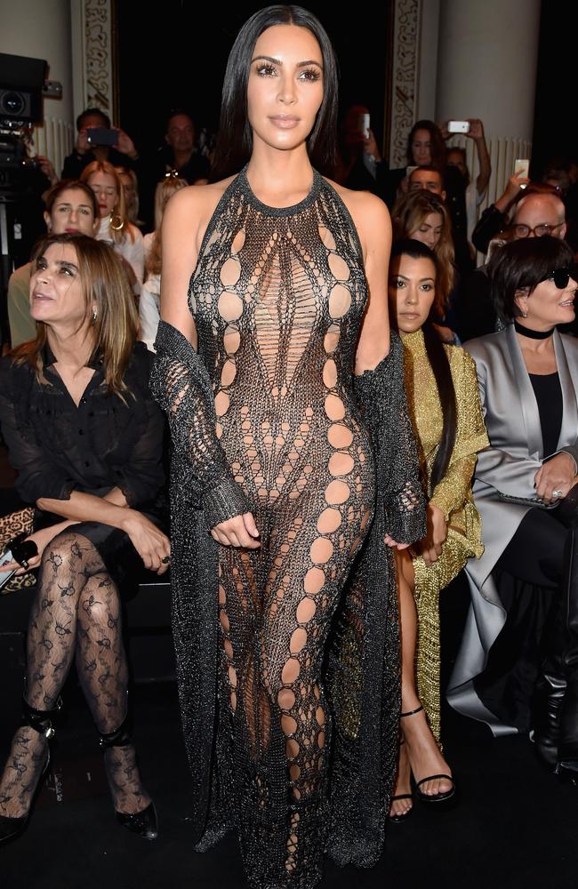 Kim’s front and centre again. Kourtney (seated, behind) looks impressed. Picture: Pascal Le Segretain/Getty Images