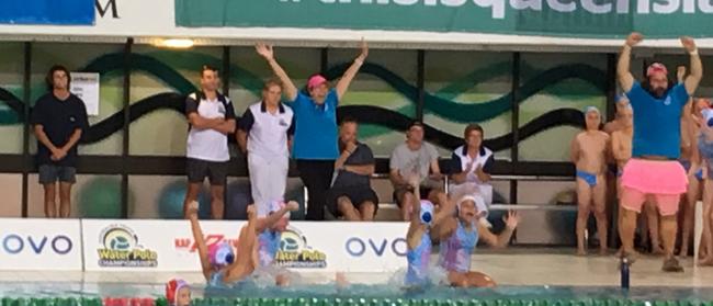 Mermaids under 12s and supporters celebrate the winning moment.