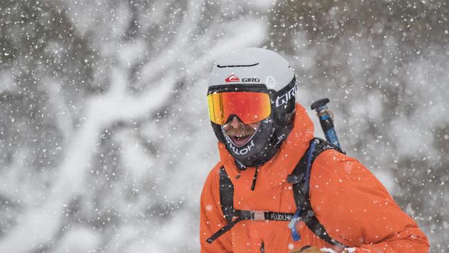 Skier Buff Farnell enjoys the fresh deep snow at Hotham Alpine Resort as a big storm system sweeps through the Australian alps. Blizzards are expected into the weekend with snow falling to very low levels in the coldest outbreak of Winter 2019. Picture: Dylan Robinson