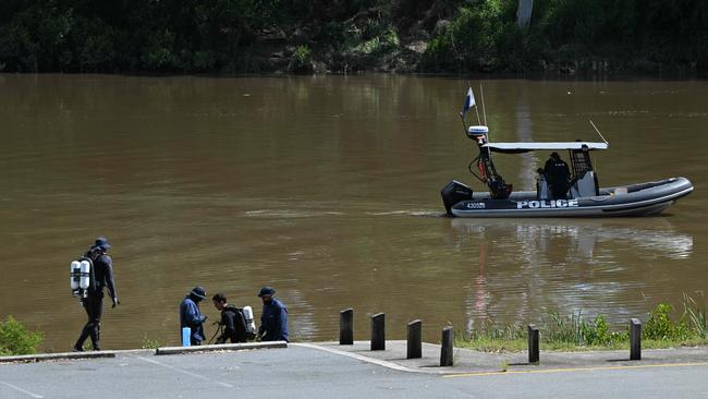 Police divers join the search. Picture: Lyndon Mechielsen