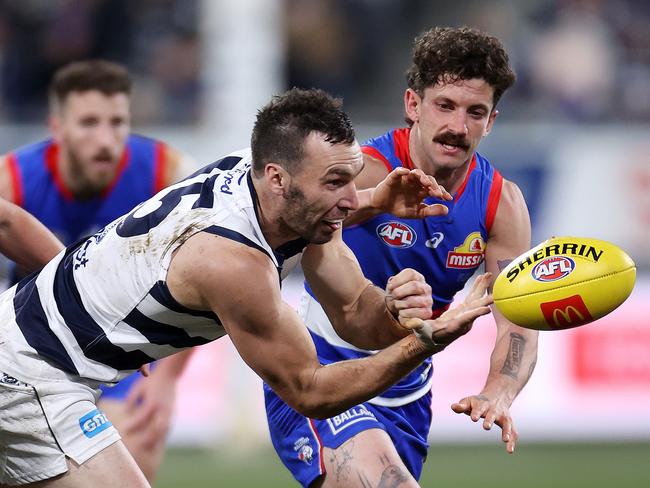 Jonathon Ceglar fires out a handball. Picture: Mark Stewart