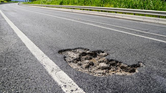 Road Tek crews are busy patching potholes along the Bruce Highway after January 2023 rainfalls closed the road at several points including at Bowen and Proserpine. Picture: Heidi Petith