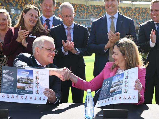 Prime Minister Scott Morrison and Queensland Premier Annastacia Palaszczuk posed for a handshake at the media event. Picture: NCA NewsWire / Dan Peled