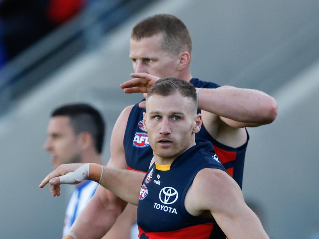 Rory Laird and Reilly O’Brien enjoy a goal. Picture: Dylan Burns/AFL Photos via Getty Images